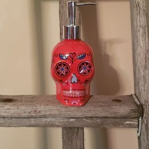 Orange sugar skull soap dispenser
